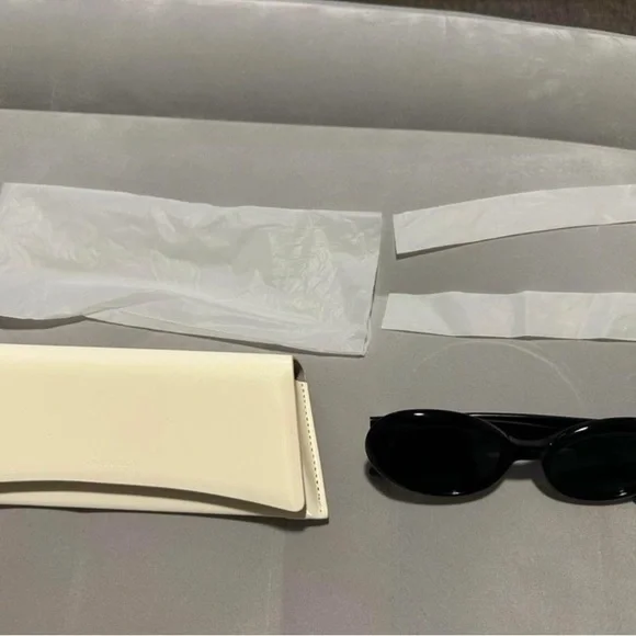 Gentle Monster Sleek Black Sunglasses